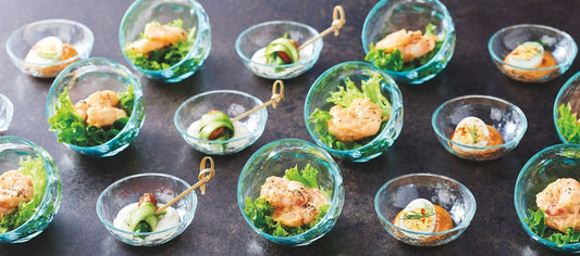 Assorted canapés presented in Dalebrook Glazz bowls, capturing the collection’s crystal-clear shine and refined catering presentation